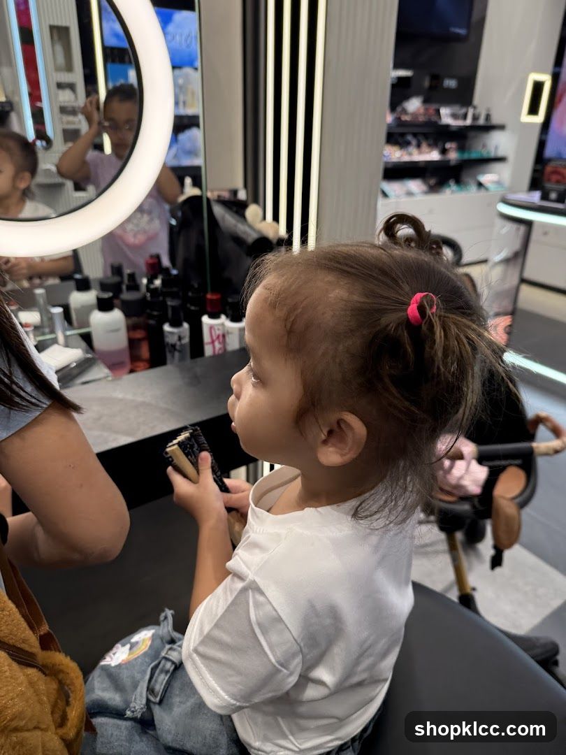 Child Getting Hair Styled