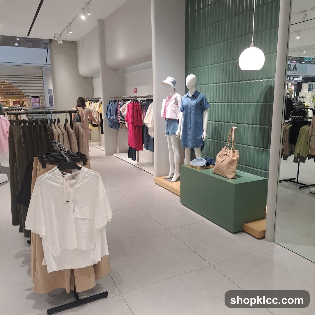 Clothing store interior with mannequins and clothing racks