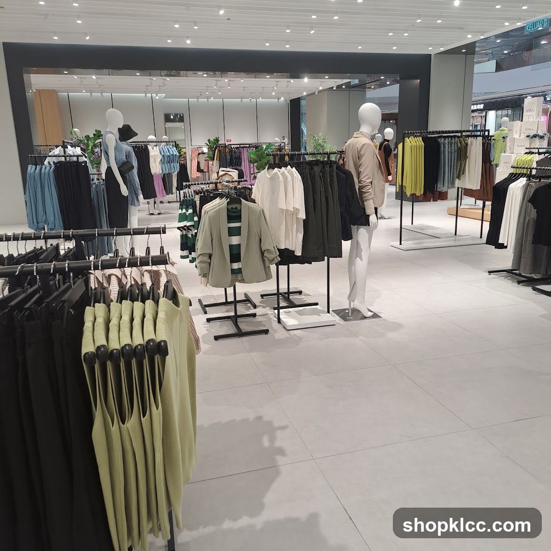 Clothing store interior with mannequins and racks of clothes