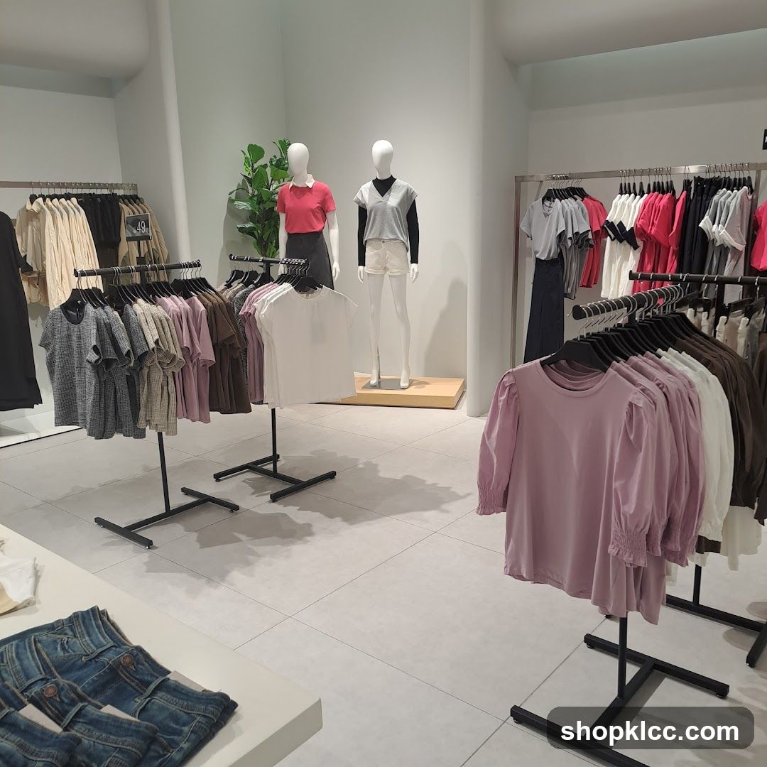 Clothing store interior with mannequins and racks of clothes