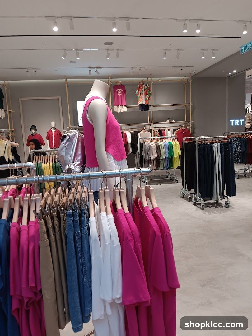 Clothing store interior with mannequins and racks of clothes