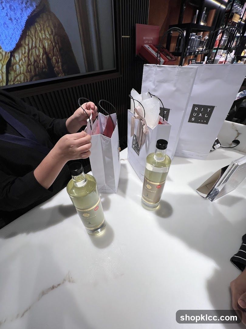 Shopping bags and bottles on a table