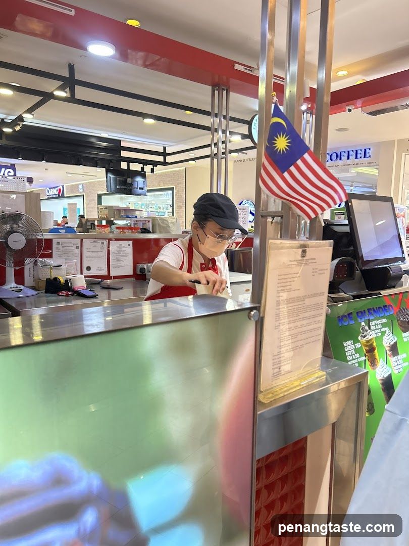 Staff preparing order at a counter
