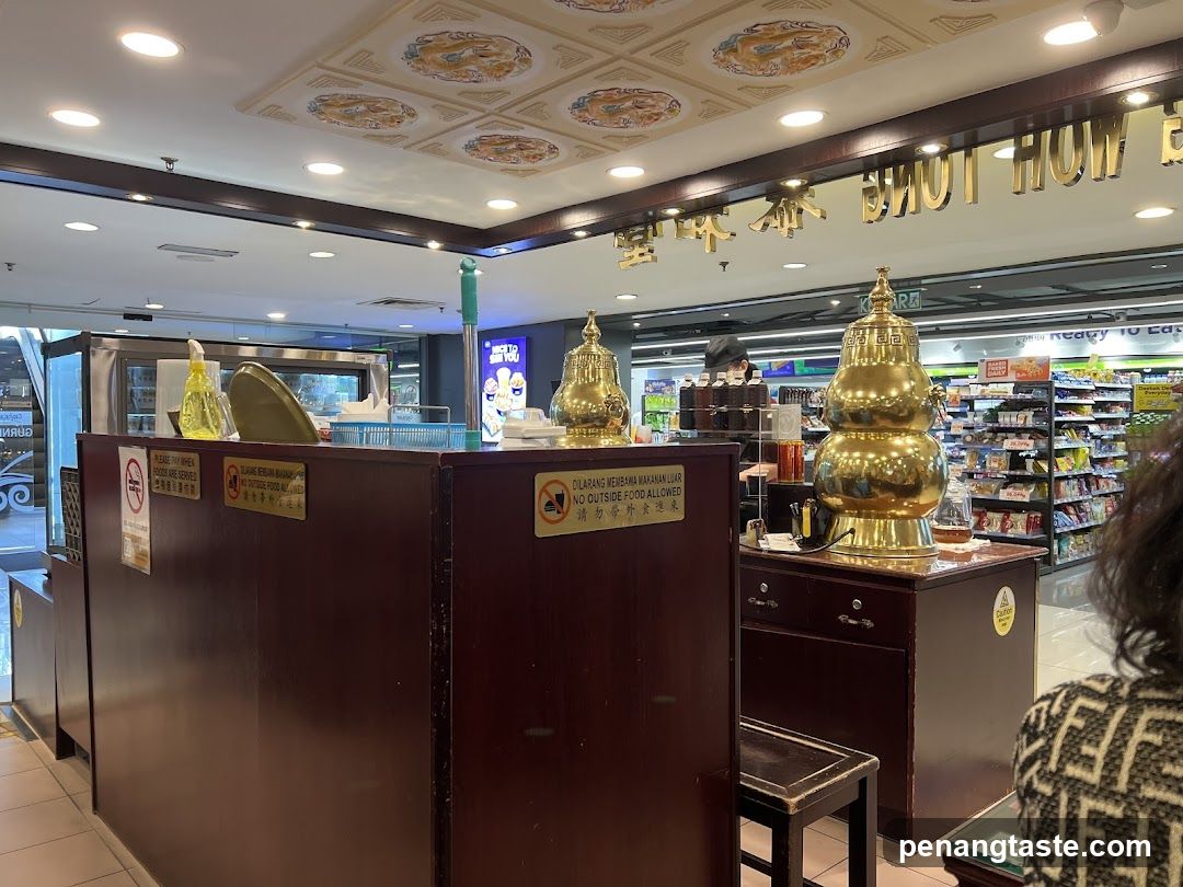 Counter with decorative urns and shelves of products