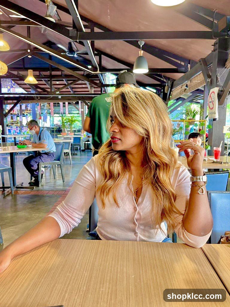 Woman sitting at a table in a restaurant