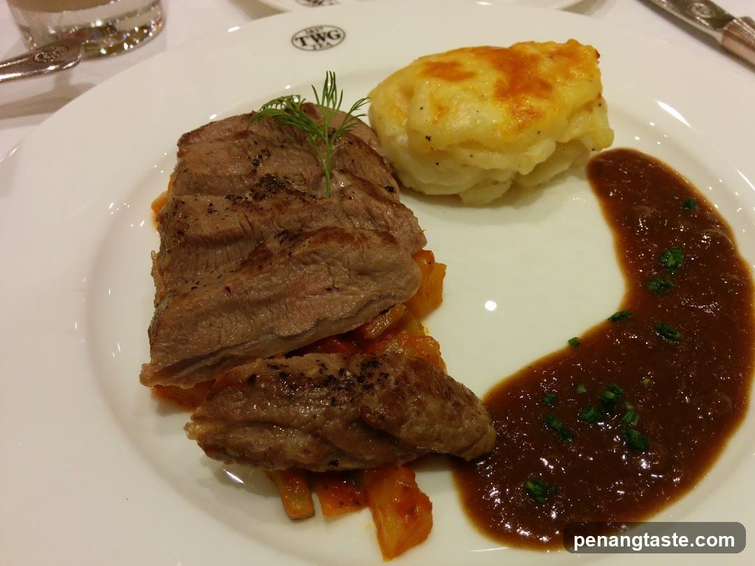 Sliced steak with mashed potatoes and sauce