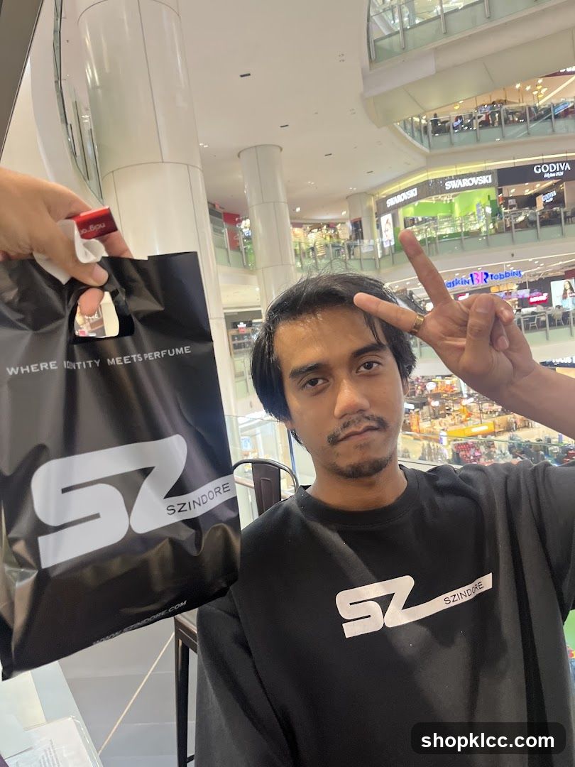 Man with shopping bag and t-shirt