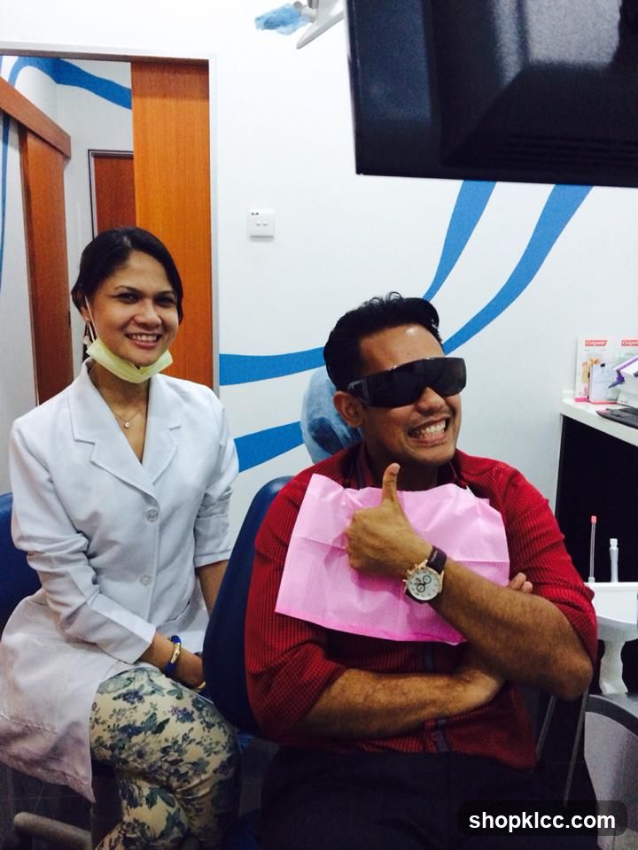 Dental Clinic Interior with Patient and Staff