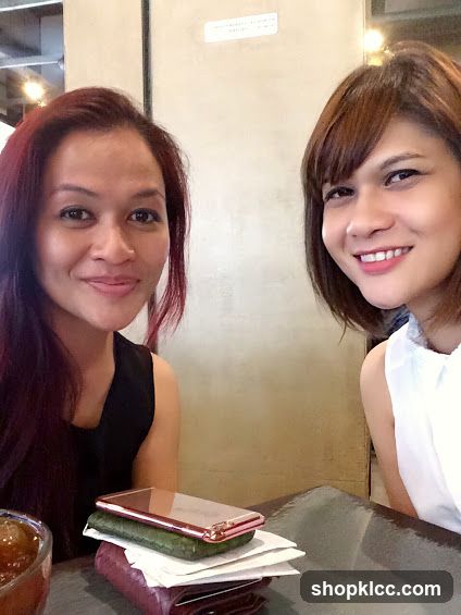 Two women at a cafe table