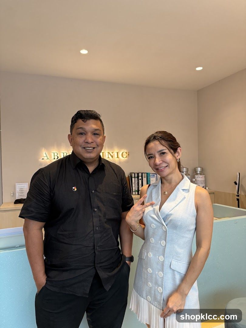 Interior photo of two people in a modern reception area
