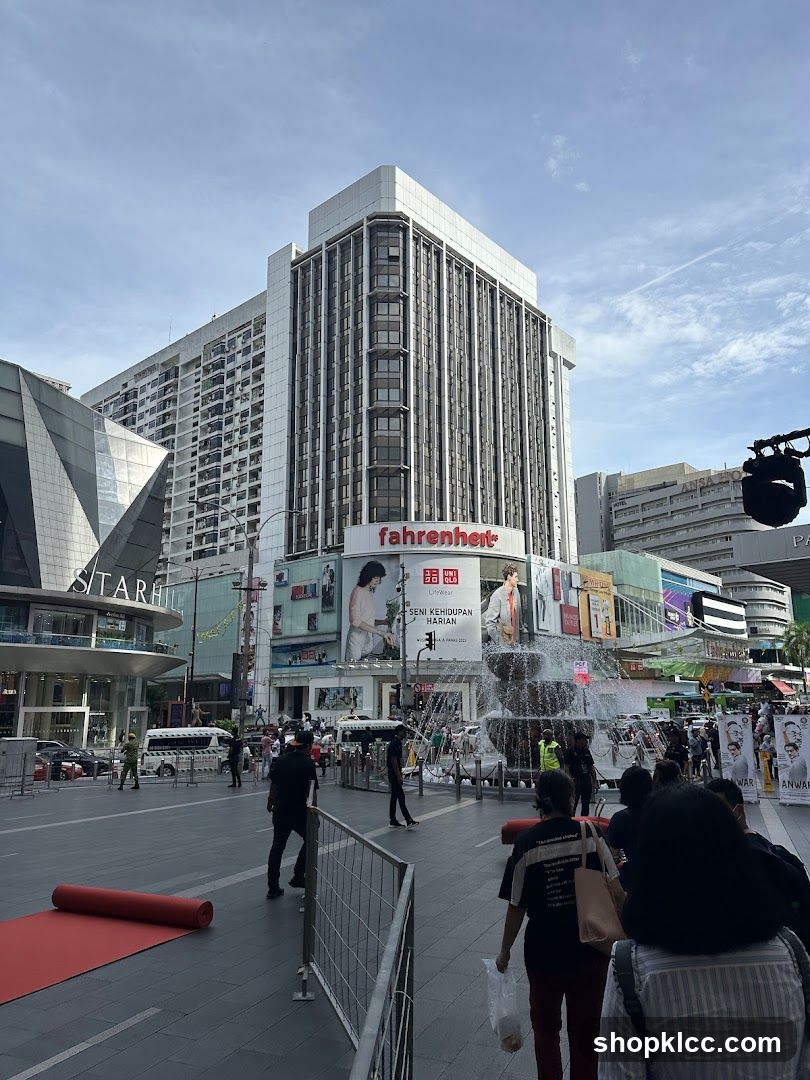 Fahrenheit Building with Fountain and Advertisements
