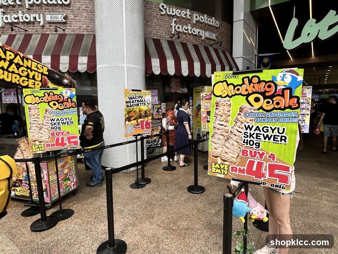 Food stall with promotional signs