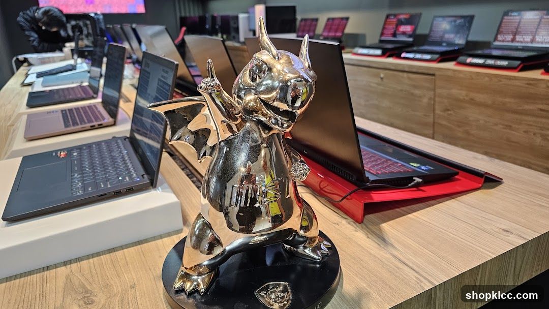 Shiny Dragon Figurine with Laptops