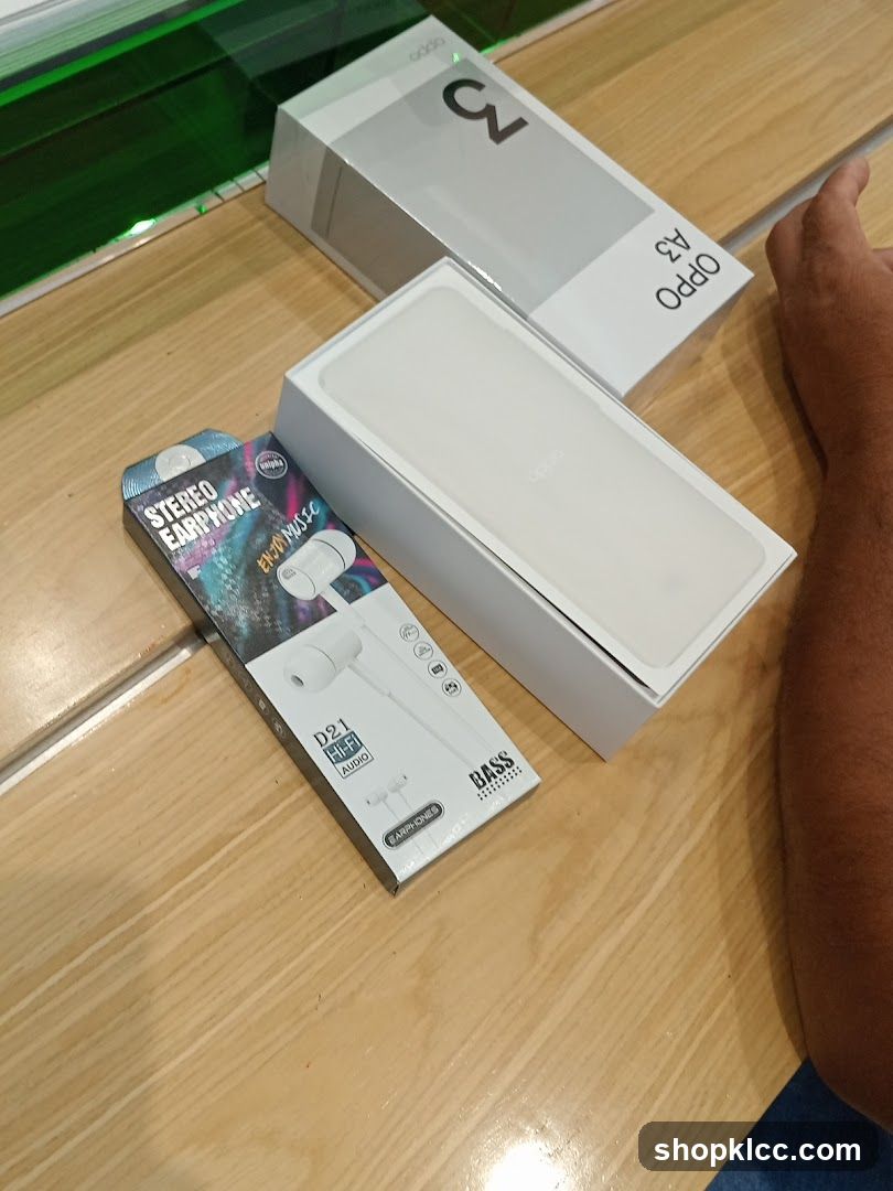 Oppo A3 Phone and Earphones