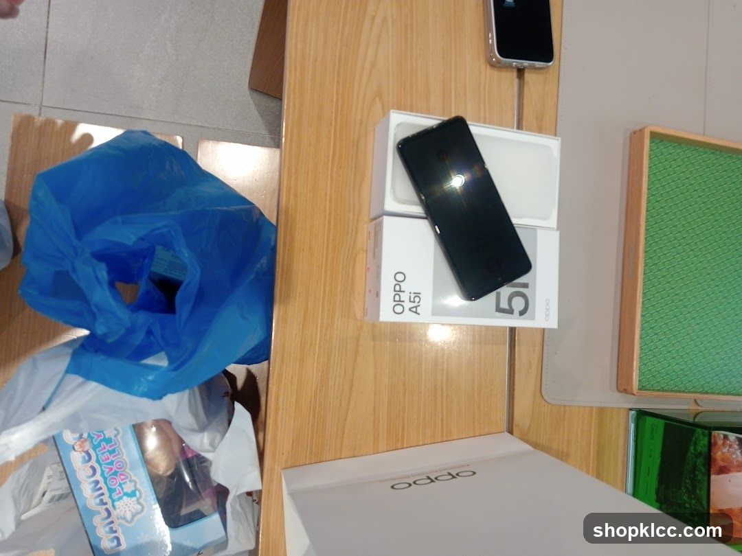 Oppo A5i Box and Phone
