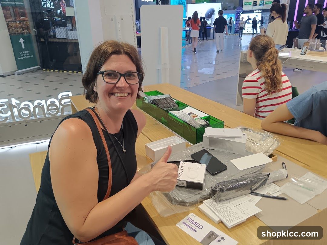 Woman giving a thumbs up with new purchases