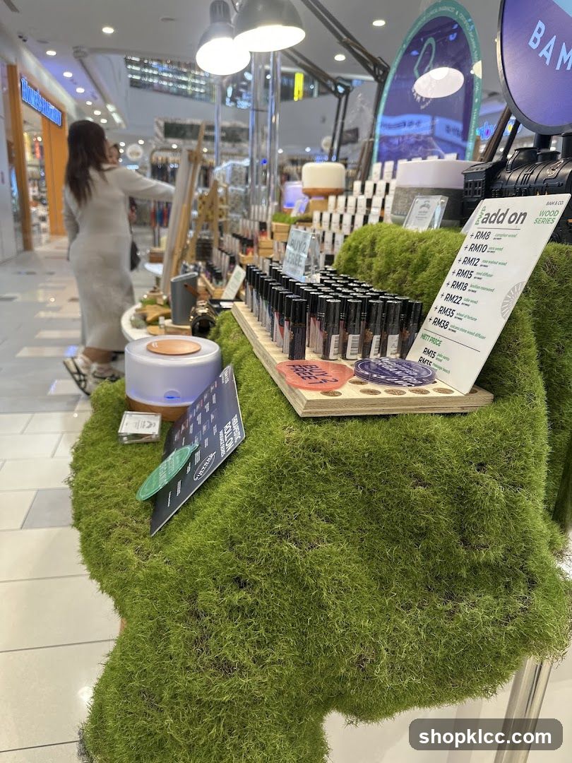 A display of essential oil roller bottles and diffusers