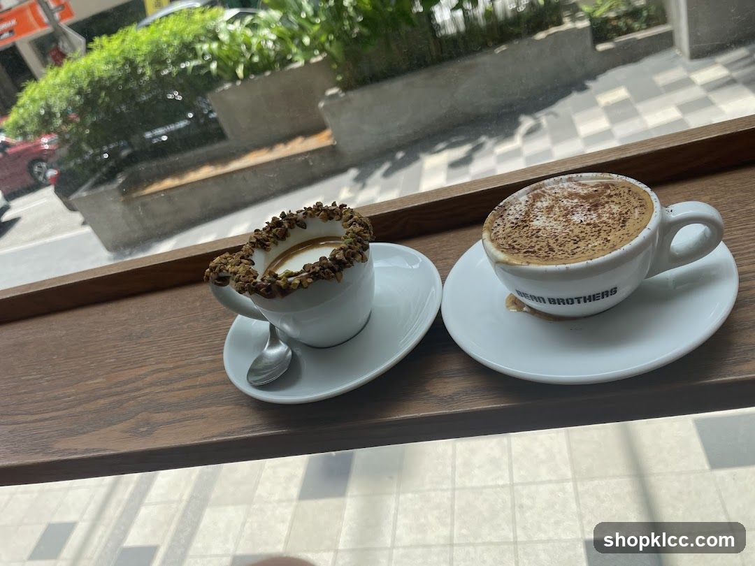Two coffees on a windowsill