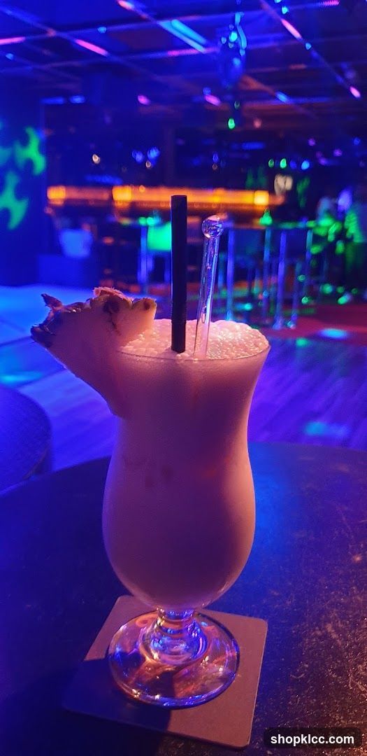 Creamy Cocktail with Pineapple Garnish