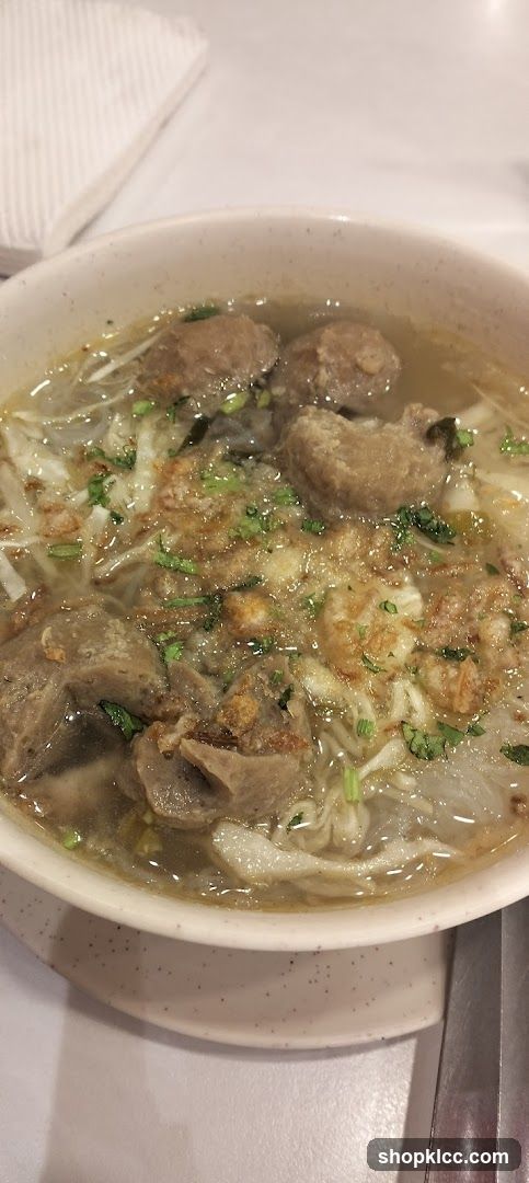 Bowl of Noodle Soup with Meatballs