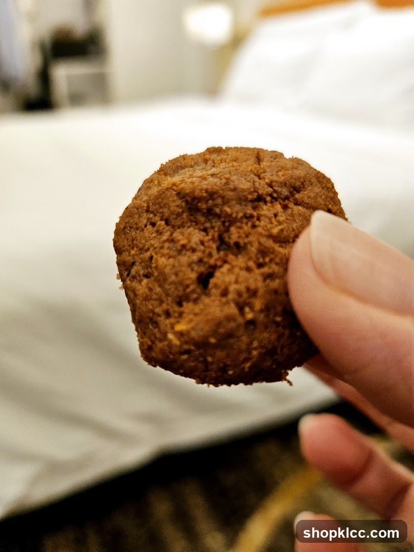 Cookie held by fingers