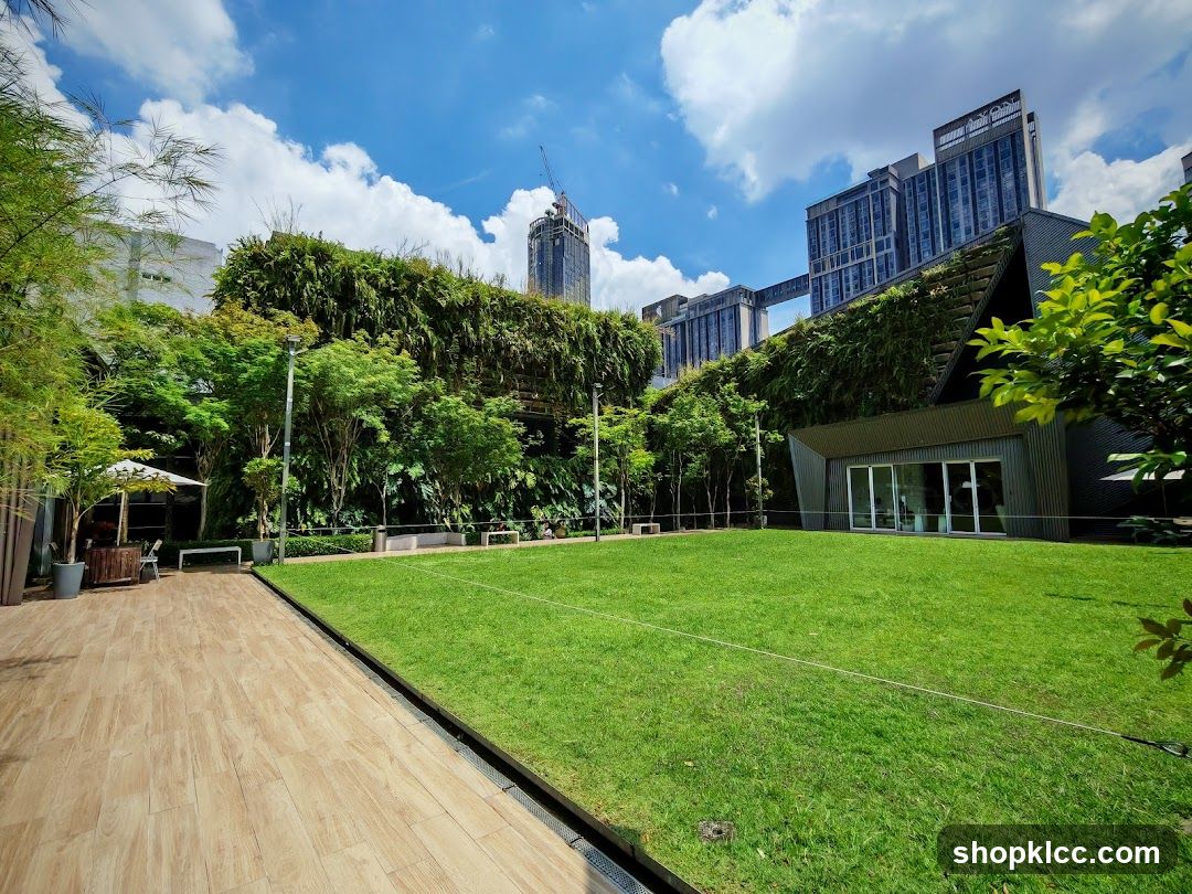 Modern Building with Green Walls and Lawn