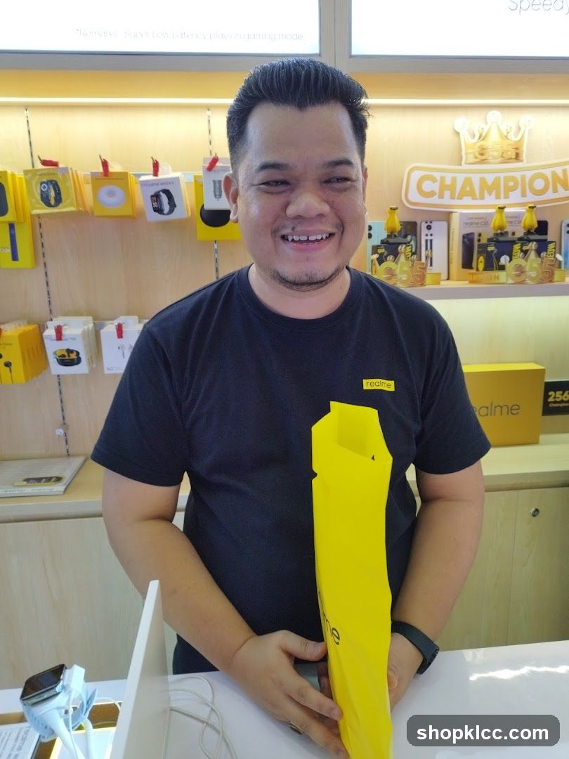 Man holding a yellow bag in a store