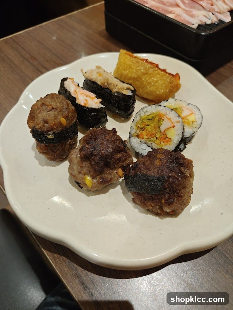 Plate of Sushi and Meatballs