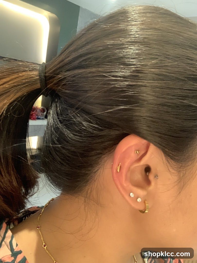 Woman's Ear with Multiple Piercings