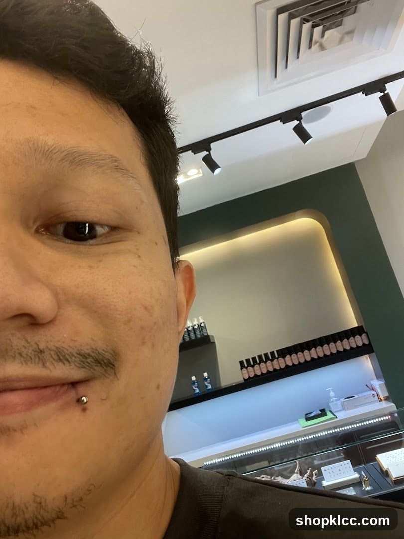 Man with lip piercing