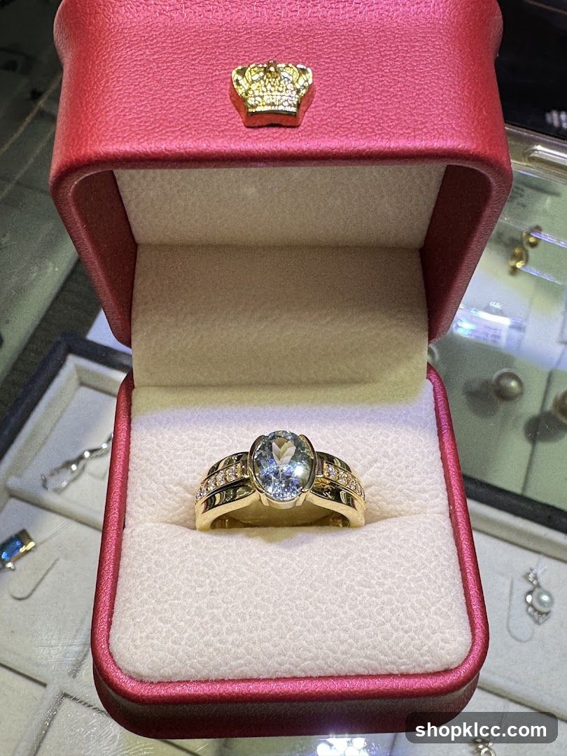 Gold ring with aquamarine and diamonds