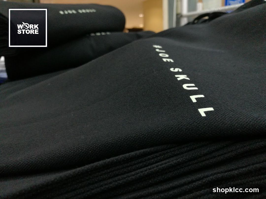 Black fabric with white text