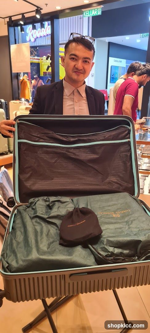 Man with Open Suitcase