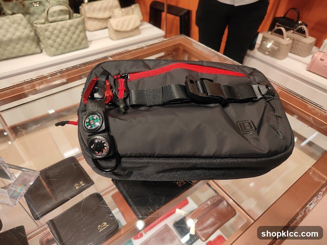 Black waist bag with compasses