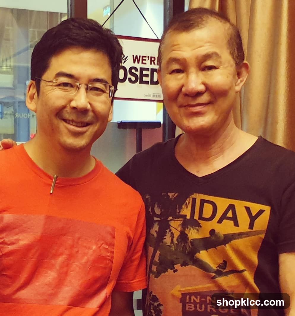 Two men posing for a photo