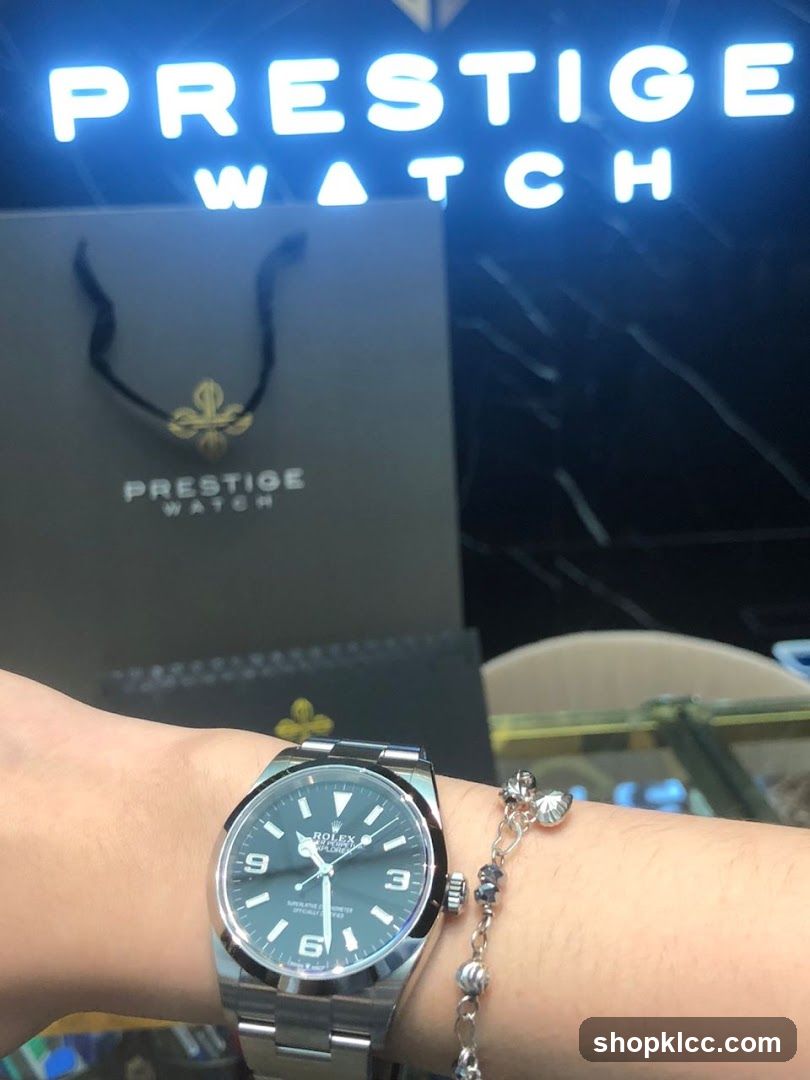 Watch on wrist with shopping bag and store sign