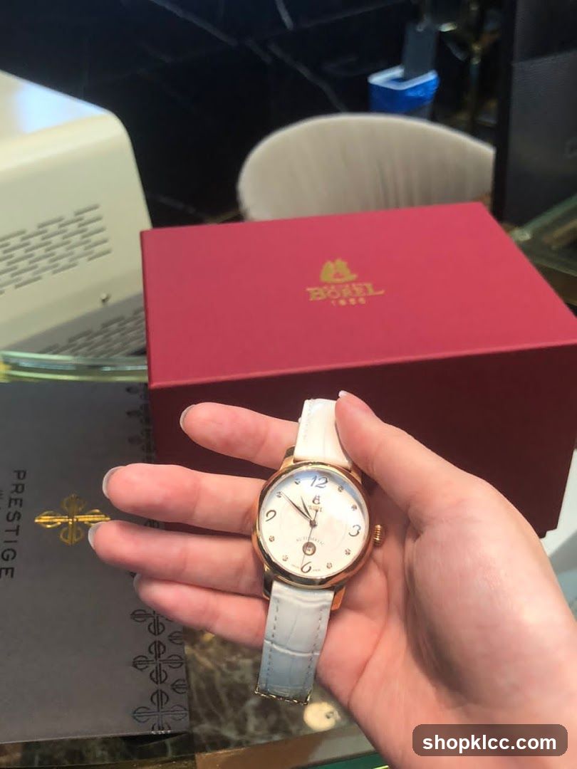 Woman holding a watch