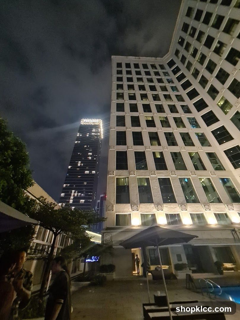 Night view of modern buildings and outdoor seating