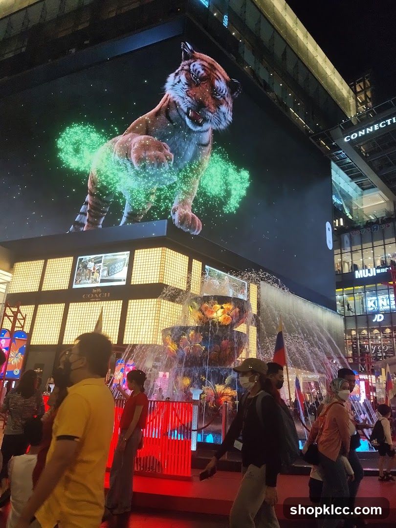 Digital Tiger Advertisement Above Fountain