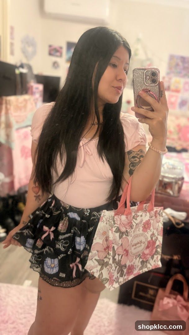Woman holding a floral tote bag