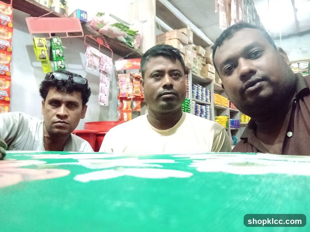 Three men in a shop
