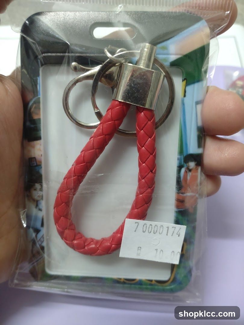 Keychain with braided red strap