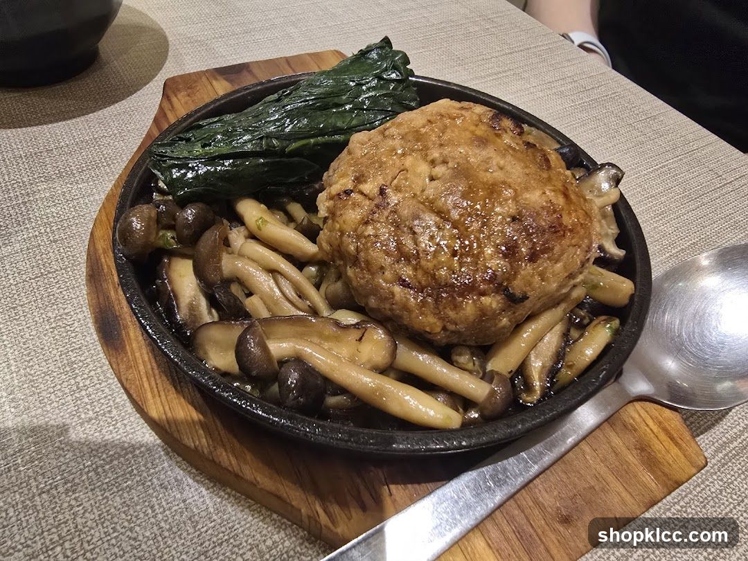 Hamburger steak with mushrooms and greens