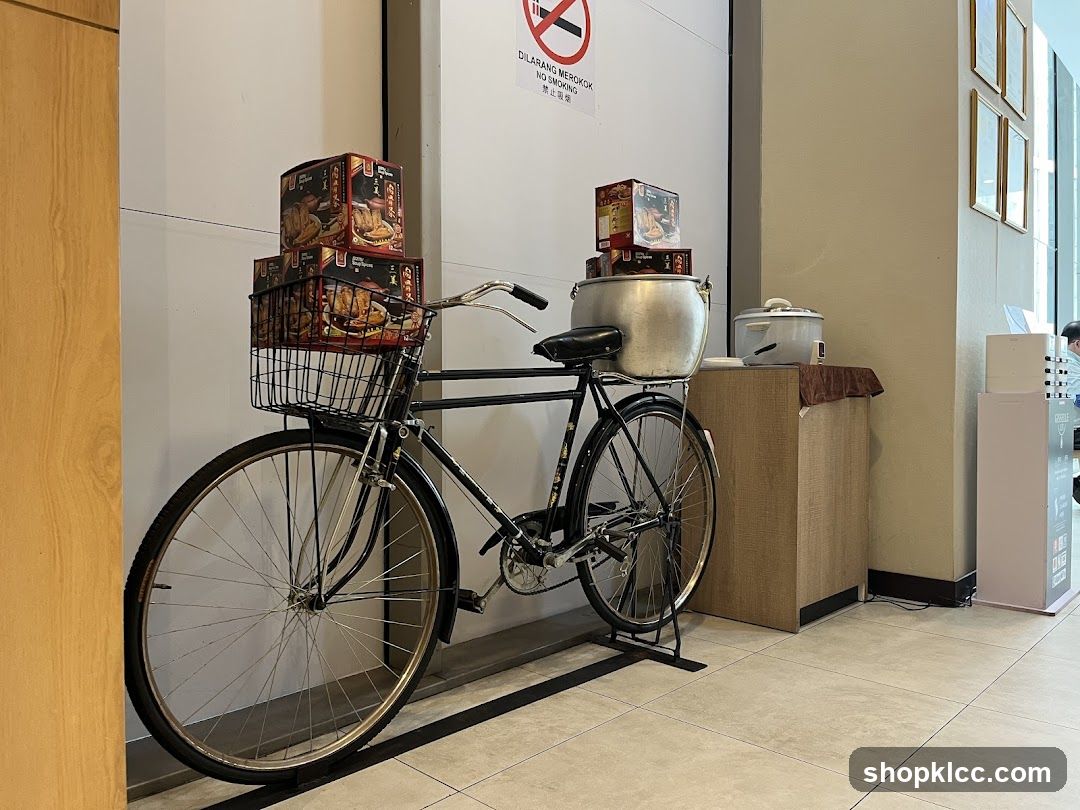 Bicycle with stacked boxes and cooking pots