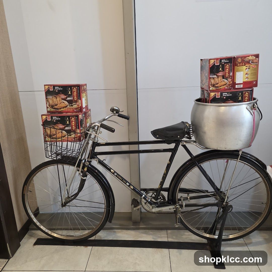 Bicycle with product boxes and pot
