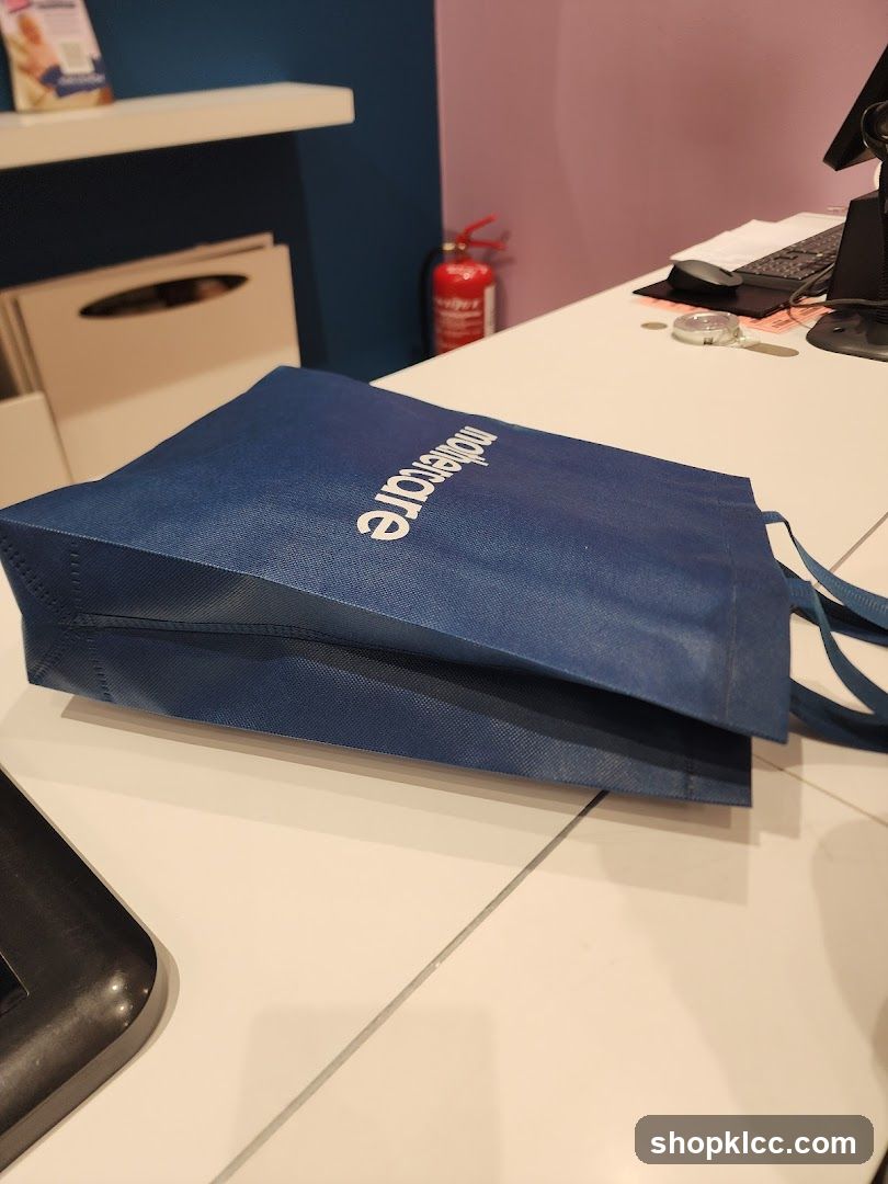 Blue shopping bag with logo