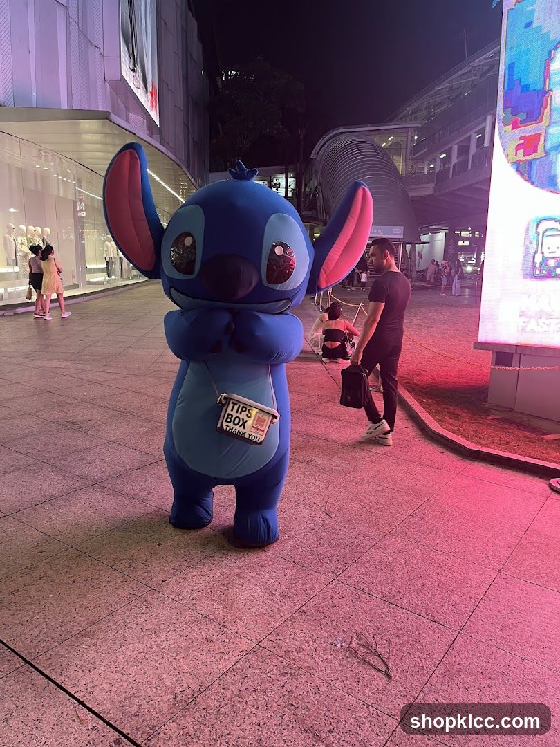 Stitch mascot with tips box
