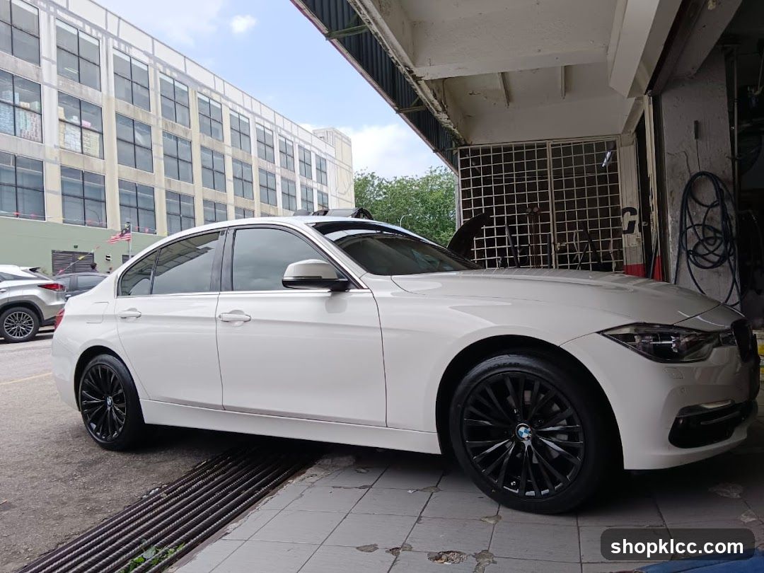 White BMW Sedan with Black Rims