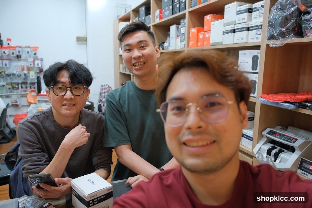 Three men in a store