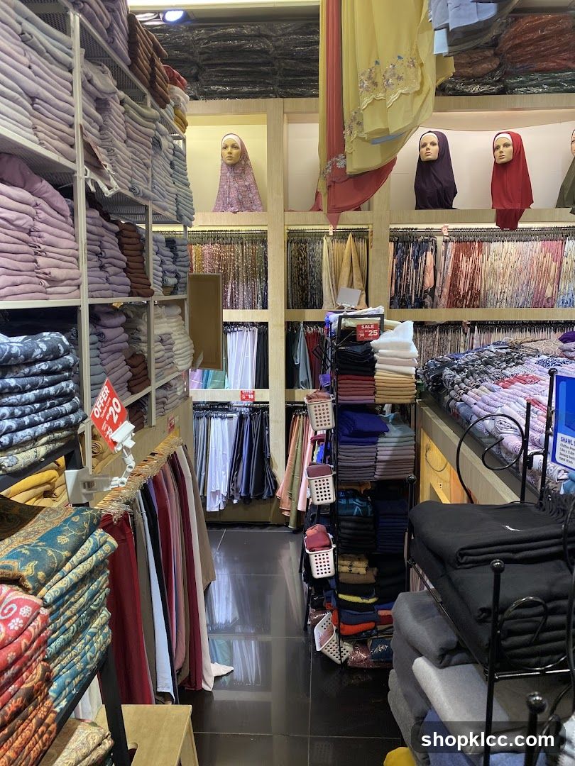 Store interior with clothing displays